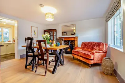 a living room with a table and a chair at 2 Bed in Nacton oc-c30257 in Nacton