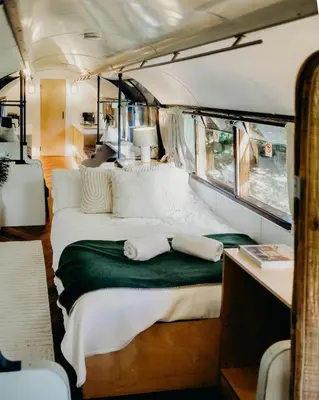 a bed in the back of a bus at Mind The Gap in Preston