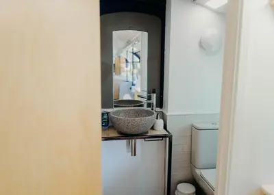 a bathroom with a sink and a toilet at Mind The Gap in Preston