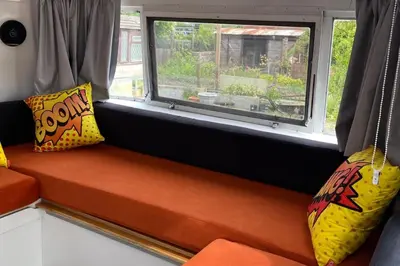 a bench in a room with a window at Bury - Lodge - Sleeps 2 - Parking in Great Welnetham