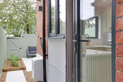 a door to a house with a patio at Luxury Two Bedroom Cottage - Bishops Stortford in Bishops Stortford
