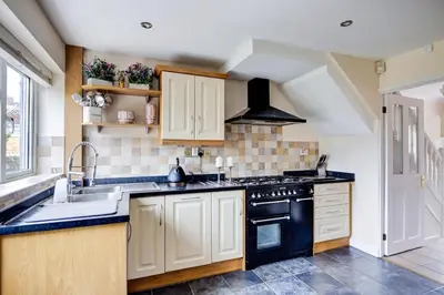 a kitchen with a sink and a stove at Luxury - 4 BHK Semi Detached House in Chelmsford