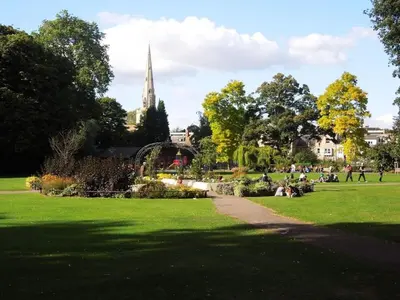 a park with people sitting in the grass at Next To Park 3 Bedroom V CENTRAL in Cambridge