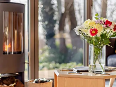 a vase of flowers sitting on top of a table at 2 Bed in Colchester oc-95941 in East Bergholt