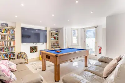 a living room with a pool table at 4 Bed in Harwich oc-s30791 in Harwich