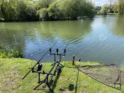 a fishing net on the side of a lake at 2 Bed Static Caravan sleeps 6 Saxmunham in Saxmundham