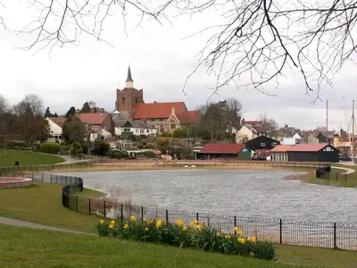 a view of a town with a pond at Primrose Lodge in Maldon in Maldon