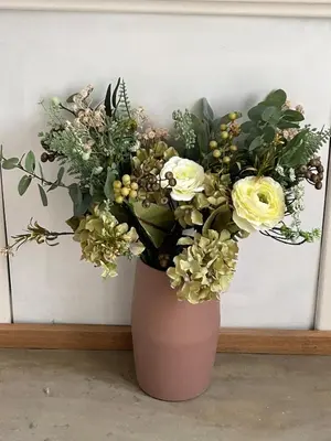 a pink vase with white flowers in it at Victorian Woodbridge cottage in Melton
