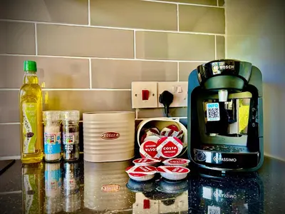 a counter top with a coffee maker and some food at 5 Bedroom House - DISC0UNTS - Parking, Contractors, Group, Family in Colchester