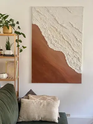 a living room with a couch and a painting on the wall at Lea Valley Nature Reserve Bright Home with Private Garden - 40 min to London by Train in Nazeing