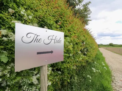 a sign that says the little next to a path at The Hide in Colchester