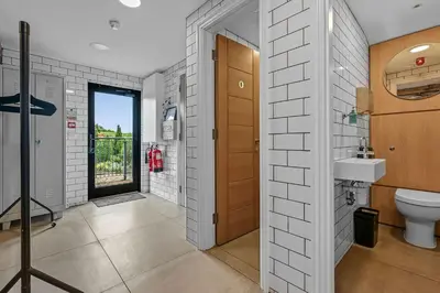 a bathroom with a toilet and a sink at The Hare's Field, Wethersfield in Wethersfield