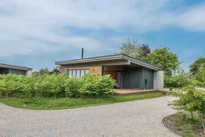a house with a gravel driveway at The Haywain, Flatford in East Bergholt