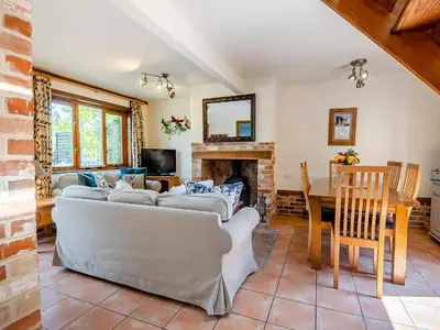 a living room with a couch and a table at Cedar - Uk49525 in Saint Lawrence