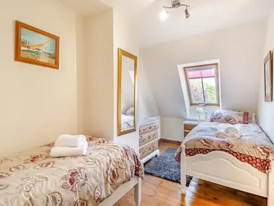 a bedroom with a bed and a mirror at Ash - Uk49524 in Saint Lawrence