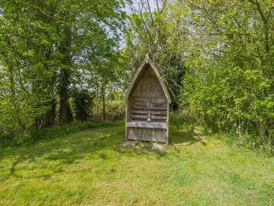 an old out house in the middle of a field at Ash - Uk49524 in Saint Lawrence