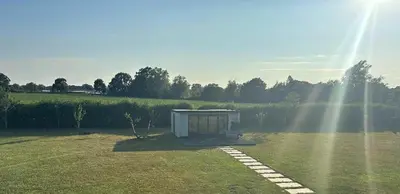 a small box sitting in the middle of a field at Little George in Rayne