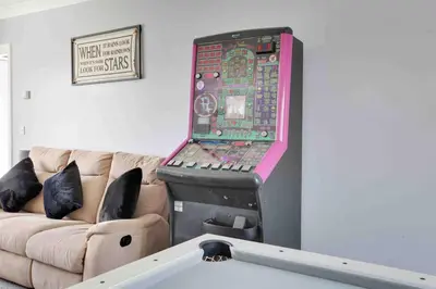 a machine with a laptop sitting on top of a couch at Wayside Warren Harlow in Potter Street