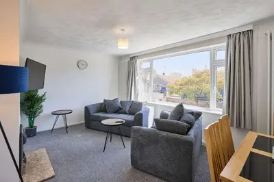 a living room with two couches and a window at Host & Stay - Park View in Thetford
