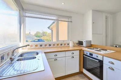 a kitchen with a sink and a window at Host & Stay - Park View in Thetford