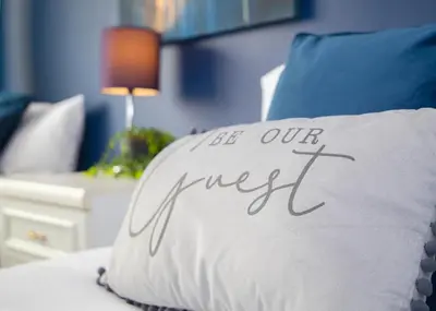 a pillow with the words be our sweet written on it at Stylish and Spacious 3-Bed House Free Parking in Ipswich