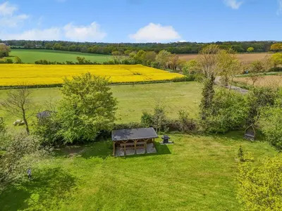 an overhead view of a field with a picnic table at Chestnut Tree Barn in Saint Lawrence