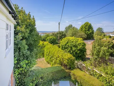 an aerial view of a garden from a house at Island Cottage in West Mersea