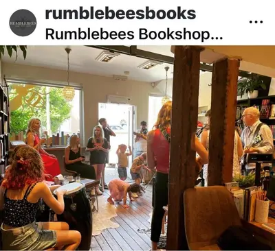 a group of people in a salon with a dog at Upstairs at Rumblebees in Felsted Station