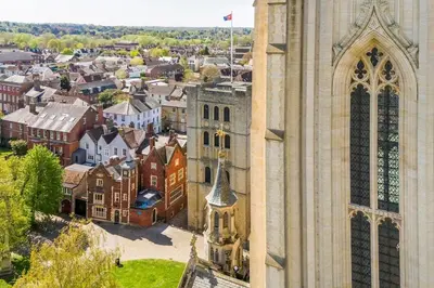 an aerial view of a church and a city at Tower Cottage - Medieval Grid Townhouse in Bury Saint Edmunds