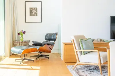 a living room with two chairs and a desk at Heath House in Thorpeness