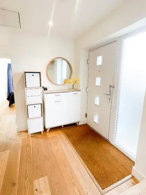 a bathroom with a sink and a mirror at Modern stylish house in Charming Fen Ditton Village in CBG