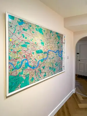 a large map hanging on a wall at Very best location - Luxury Studio by river and historic city centre in Cambridge