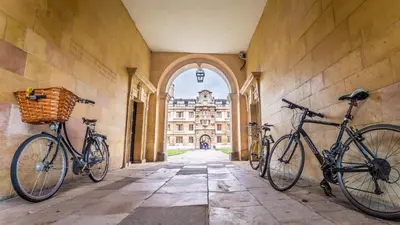 two bikes parked on the wall of a building at Cute and Spacious 1 Bed House by Station and River in Cambridge