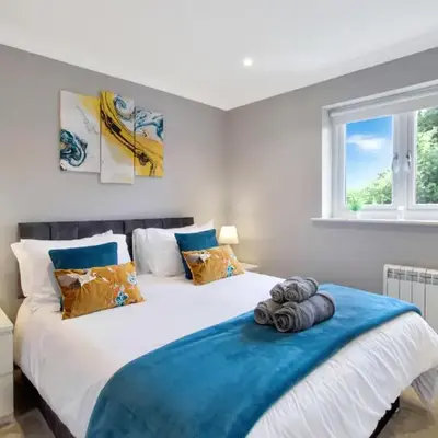 Spotless Two-Bedroom Home with Garden and Parking