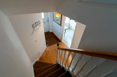 an overhead view of a staircase in a house at Stylish luxury on edge of Cambridge Free Parking Pass the Keys in Cottenham
