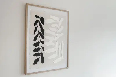 a framed picture of a plant on a wall at 15 Mins to Sizewell C - Driveway Parking - Contractor Friendly - 2 Bedroom in Saxmundham