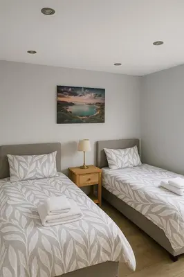 two beds sitting next to each other in a bedroom at Weekly Deal- 4BDR House By Homestyles Hosts Short Lets & Serviced Accommodation Suffolk With Private En-Suite & Free Parking in Ipswich