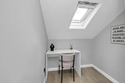a white desk with a chair and a window at Weekly Deal- 4BDR House By Homestyles Hosts Short Lets & Serviced Accommodation Suffolk With Private En-Suite & Free Parking in Ipswich