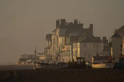 a group of houses and boats on the beach at Danes House 4 in Aldeburgh
