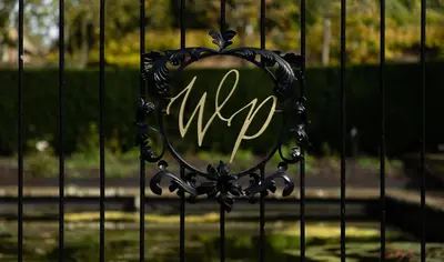 a iron gate with the word mum written on it at The Flat - Waresley Park Estate