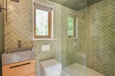 a bathroom with a toilet and a sink at Beech Cottage - one bedroom retreat with hot tub in Hatfield Broad Oak