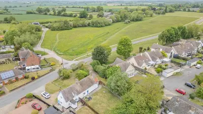 an aerial view of a village with houses at 3 Bed in Stowupland oc-p32216 in Stowmarket