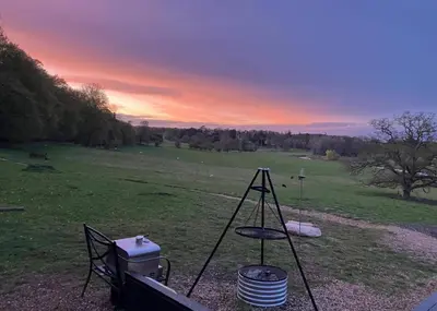 a view of a field with a grill and aperature at Stables 2bed farm stay private firepit bbq in Bramfield
