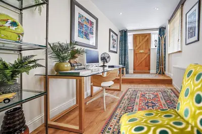 a home office with a desk and a chair at 28 Church Ponds, Castle Hedingham in Castle Hedingham