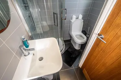 a small bathroom with a sink and a toilet at Newly Renovated Sanctuary for 4 in Tacket Street, Ipswich in Ipswich