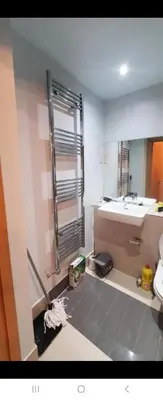 a bathroom with a sink and a mirror at 1 bed luxurious flat in Basildon