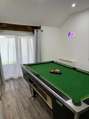 a room with a pool table in a room at Hertford Home detached garden parking pet allowed in Hertford