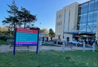 a sign in the grass in front of a building at Weekday Special - 4BDR House By Homestyles Hosts Short Lets & Serviced Accommodation Ipswich Near Town Centre With Free Parking in Ipswich