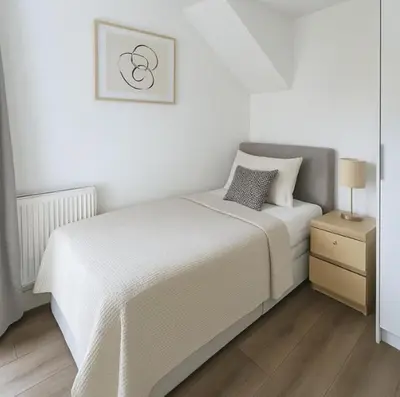 a white bedroom with a bed and a night stand at Weekday Special - 4BDR House By Homestyles Hosts Short Lets & Serviced Accommodation Ipswich Near Town Centre With Free Parking in Ipswich