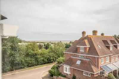 an aerial view of a house with a roof at Cherry Tree House, Aldeburgh in Aldeburgh